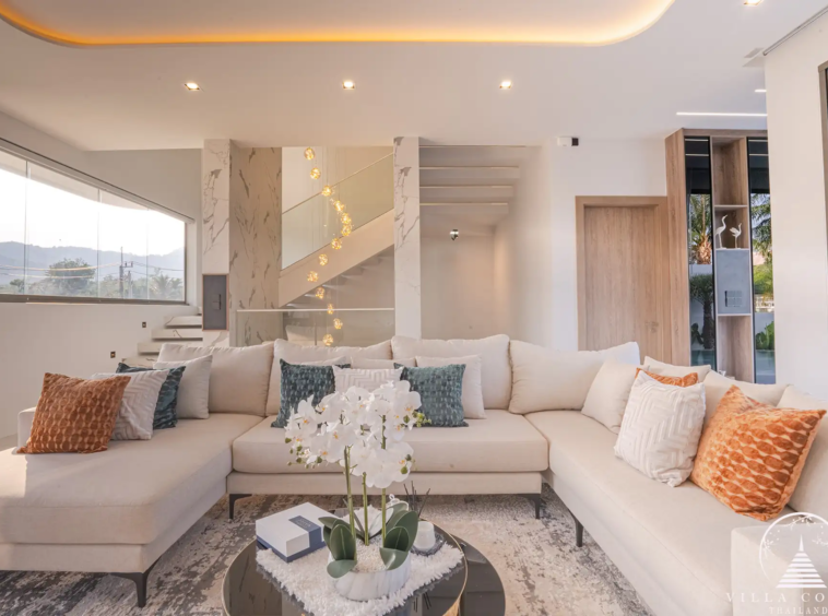 Spacious living area with modern furnishings in The PRIVA Golf Course Villa.