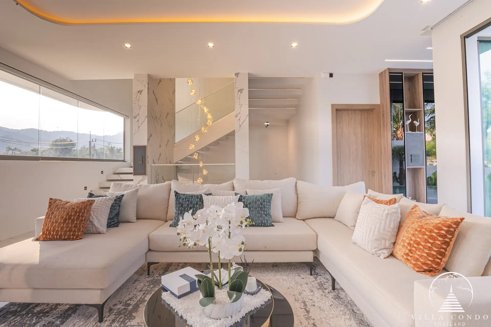 Spacious living area with modern furnishings in The PRIVA Golf Course Villa.