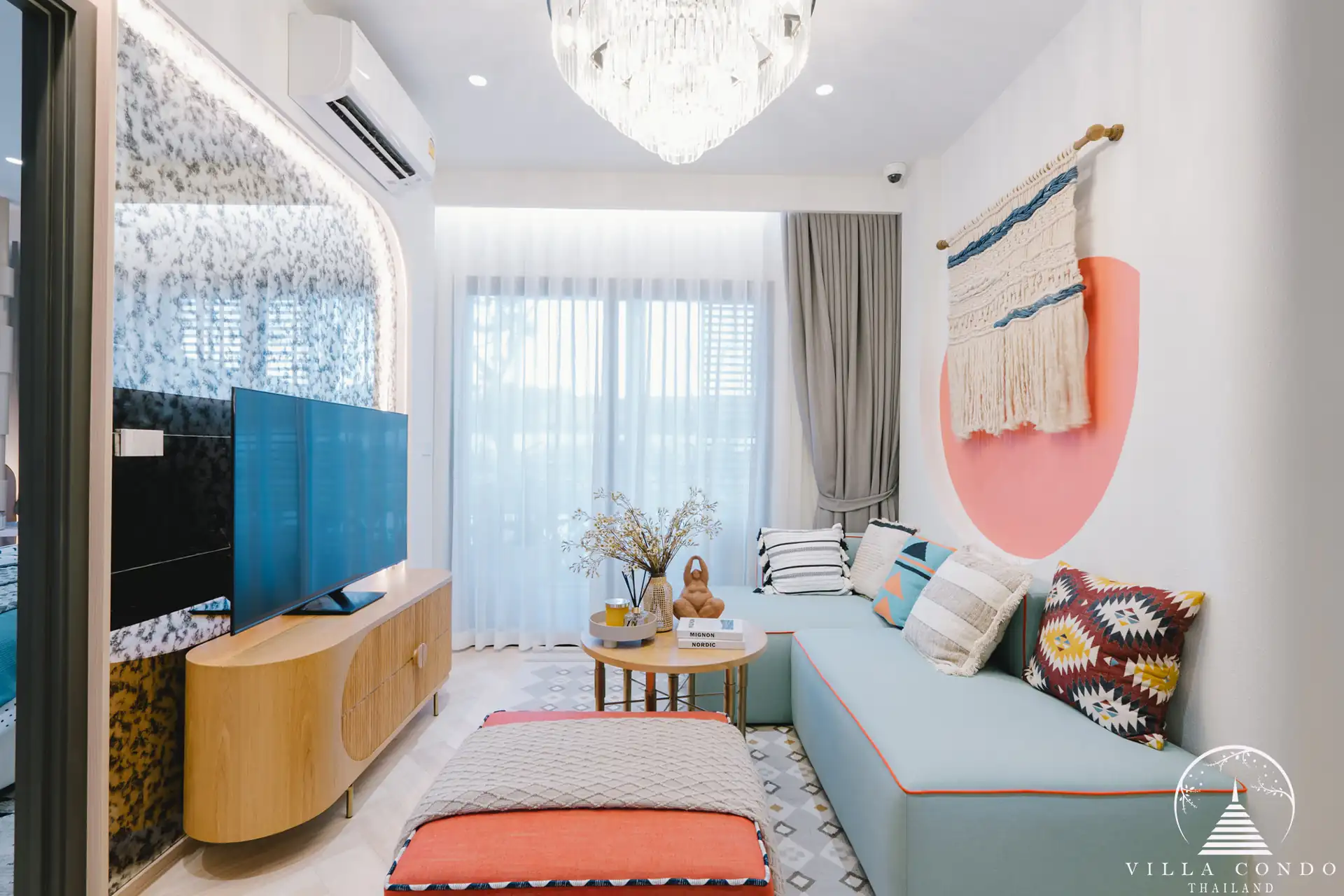 Spacious living area with comfortable seating and modern decor.
