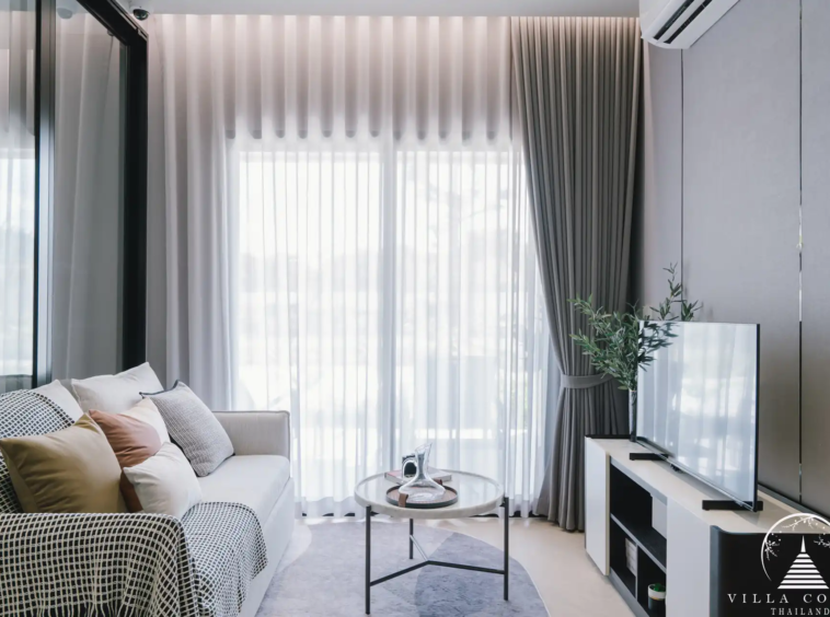 Spacious living area with comfortable seating and modern decor.