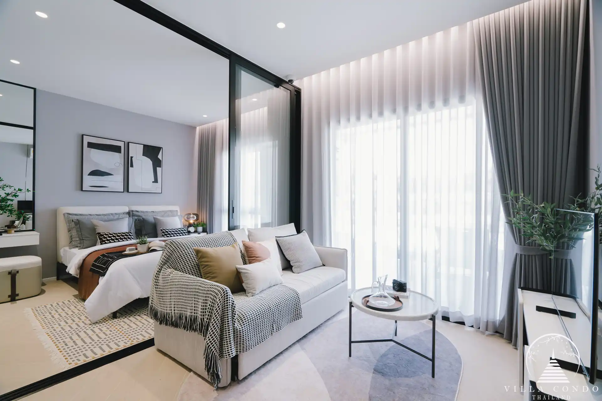 Spacious living area with comfortable seating and modern decor.