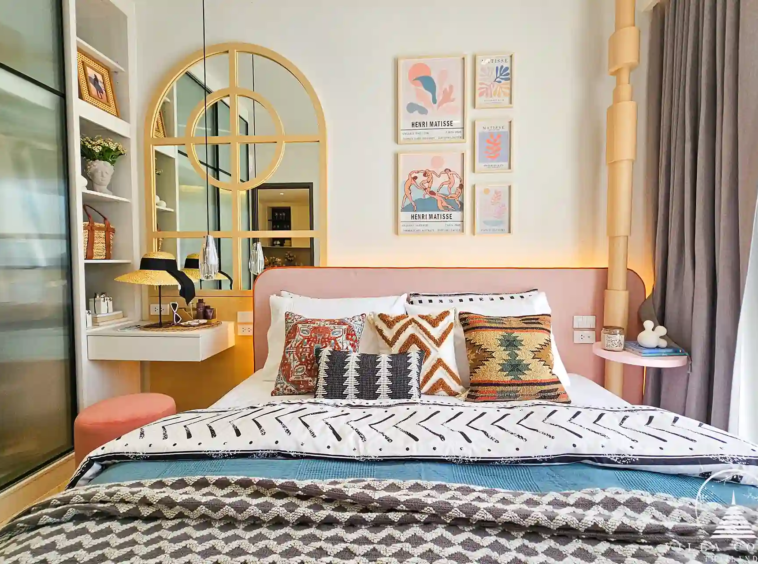 Luxurious master bedroom with elegant decor.