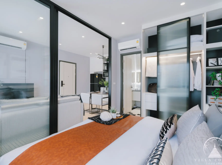 Spacious bedroom with elegant furnishings and decor.