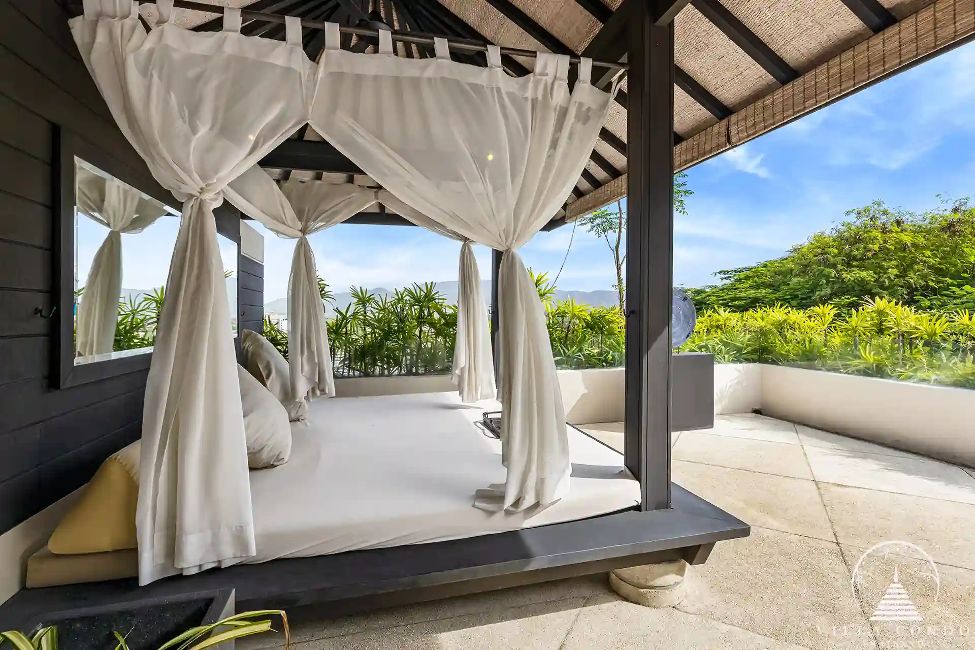 Outdoor bed at Spa Pool Penthouse Layan Hills with stunning valley views