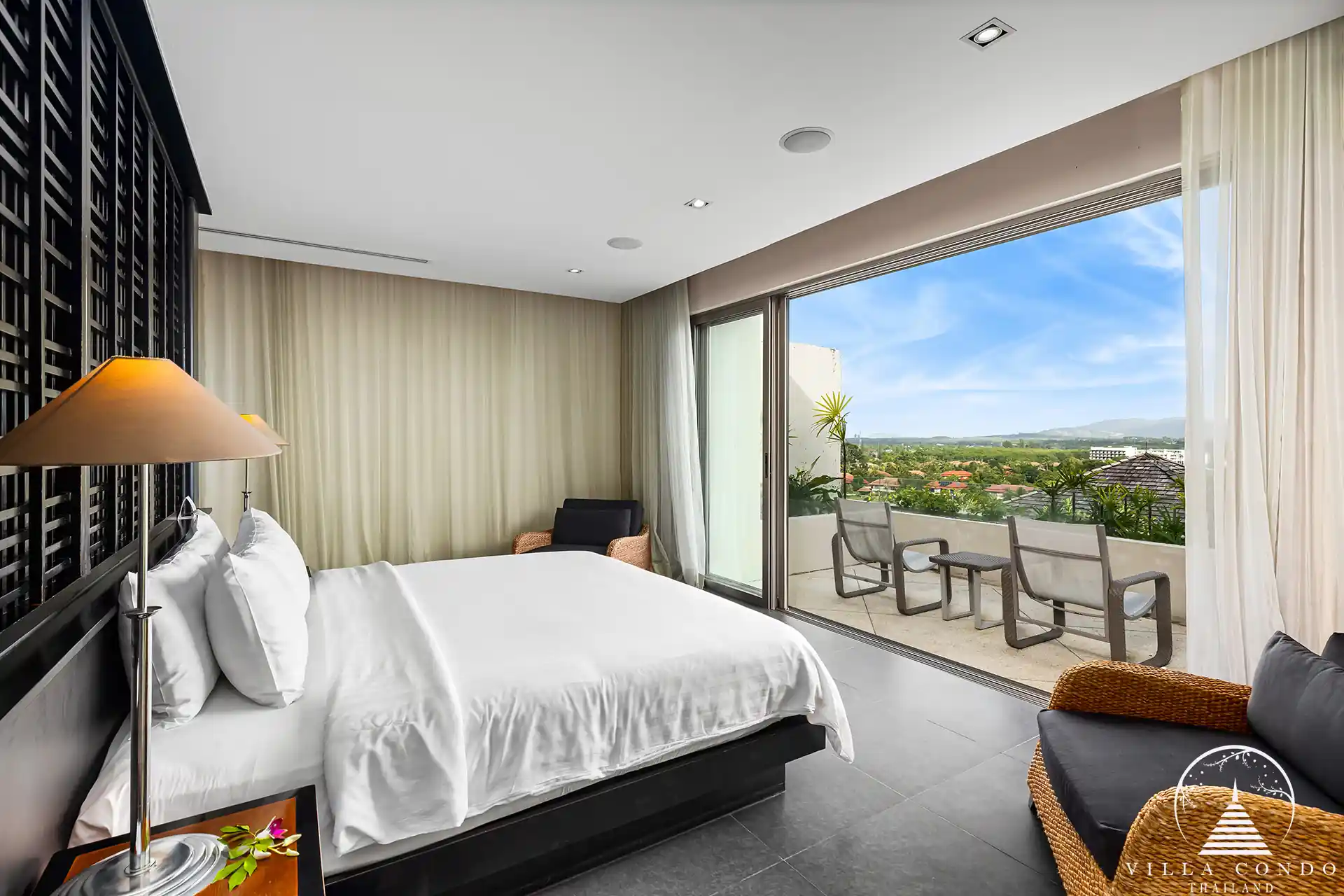 Master bedroom at Spa Pool Penthouse Layan Hills with private balcony