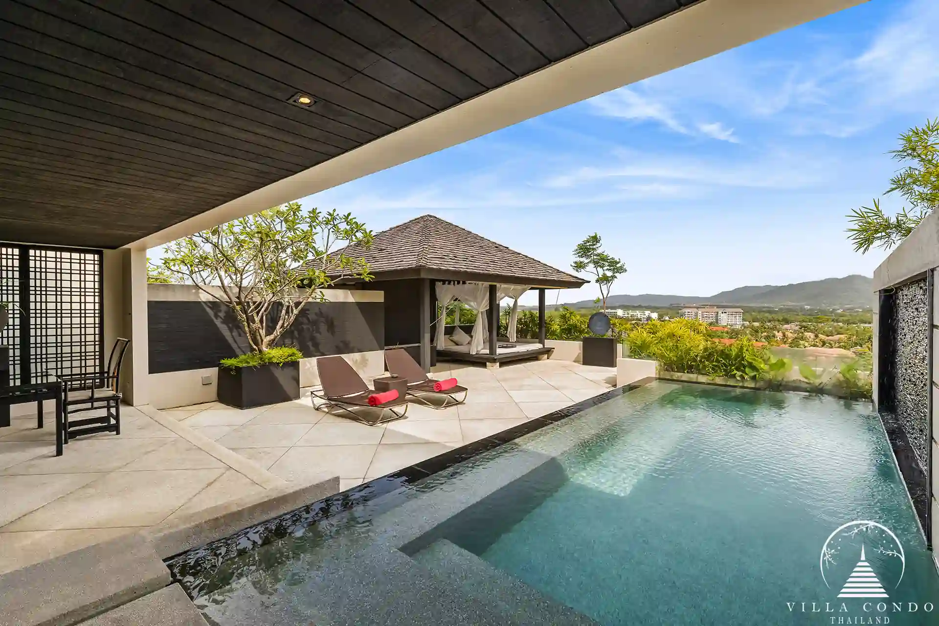 Private pool with sunbeds at Spa Pool Penthouse Layan Hills