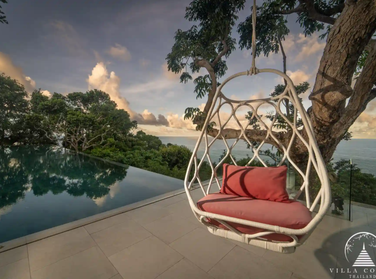 Villa Amarisa outdoor hanging sofa on the terrace with sea views.