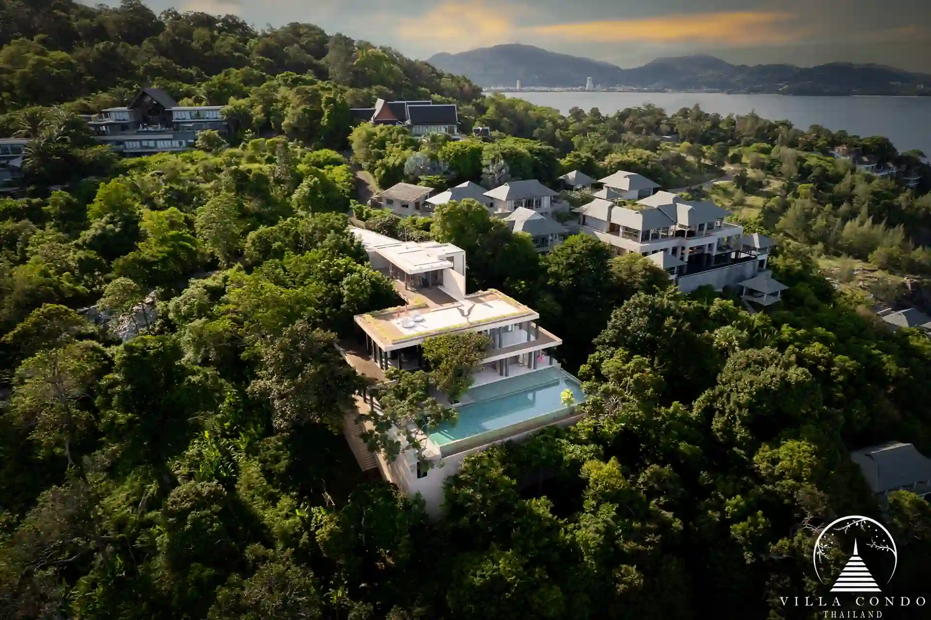 Morning view of Villa Amarisa, with the sun rising over the Andaman Sea.
