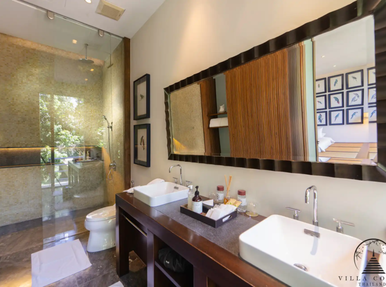 Spacious bathroom at Villa Amarisa with Moroccan-tiled showers and double vanity.