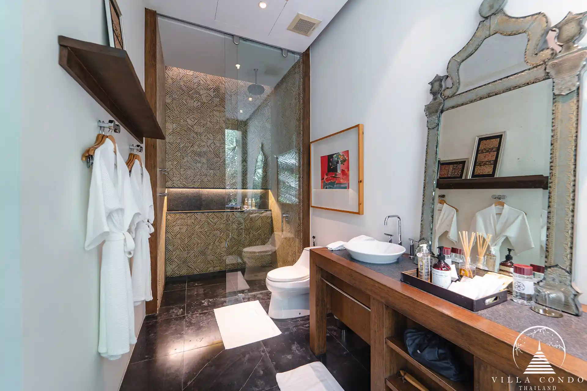 Spacious bathroom at Villa Amarisa with Moroccan-tiled showers and double vanity.