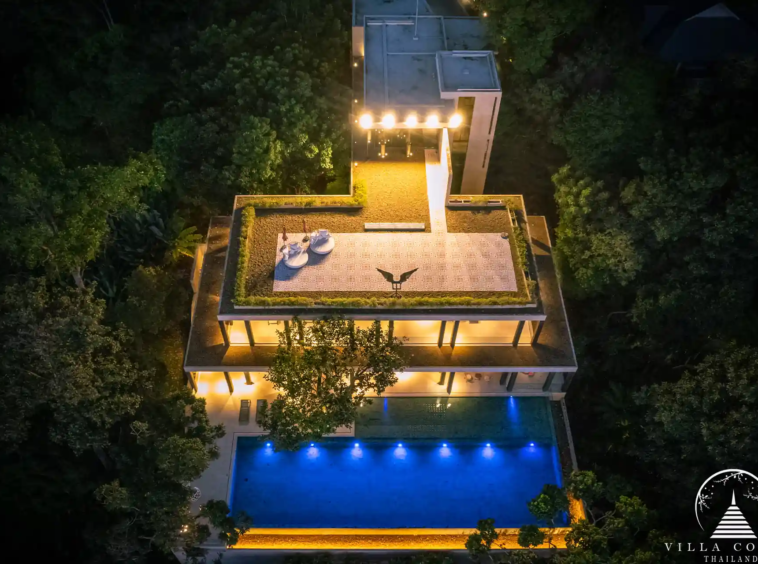 Night view of Villa Amarisa, with the villa illuminated against the backdrop of the Andaman Sea.