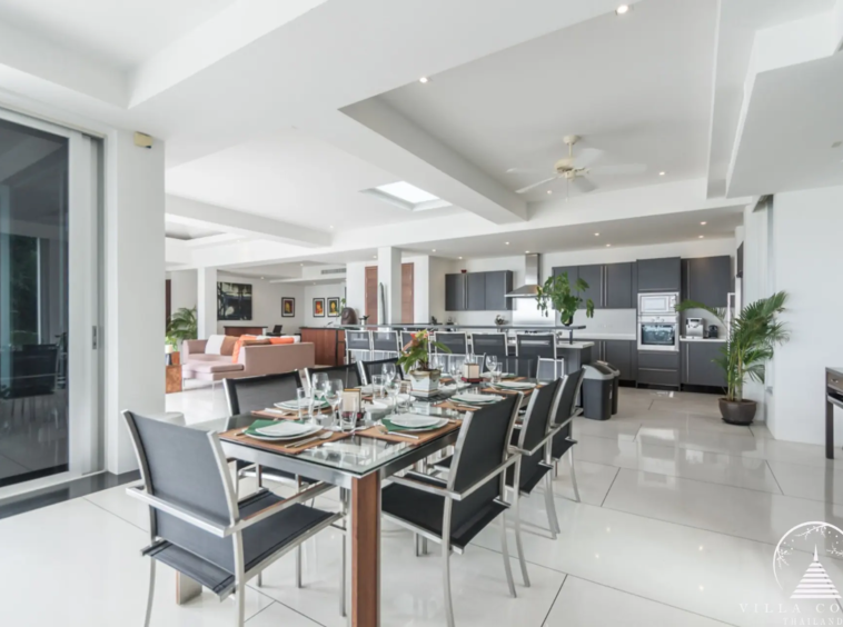 Elegant dining area at Villa Bauhinia with sea view