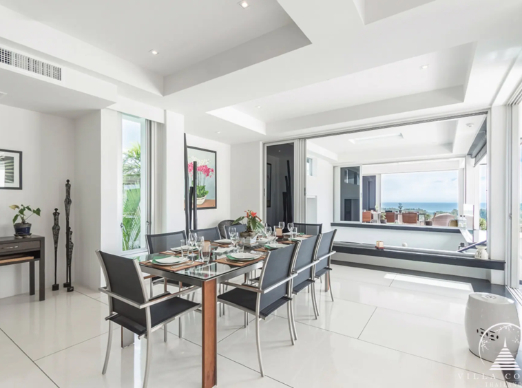 Elegant dining area at Villa Bauhinia with sea view