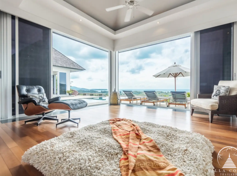 Master bedroom at Villa Bauhinia with private balcony and sea view
