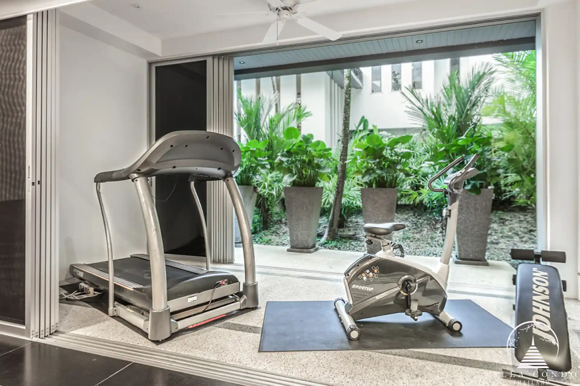 Private gym at Villa Bauhinia with modern equipment