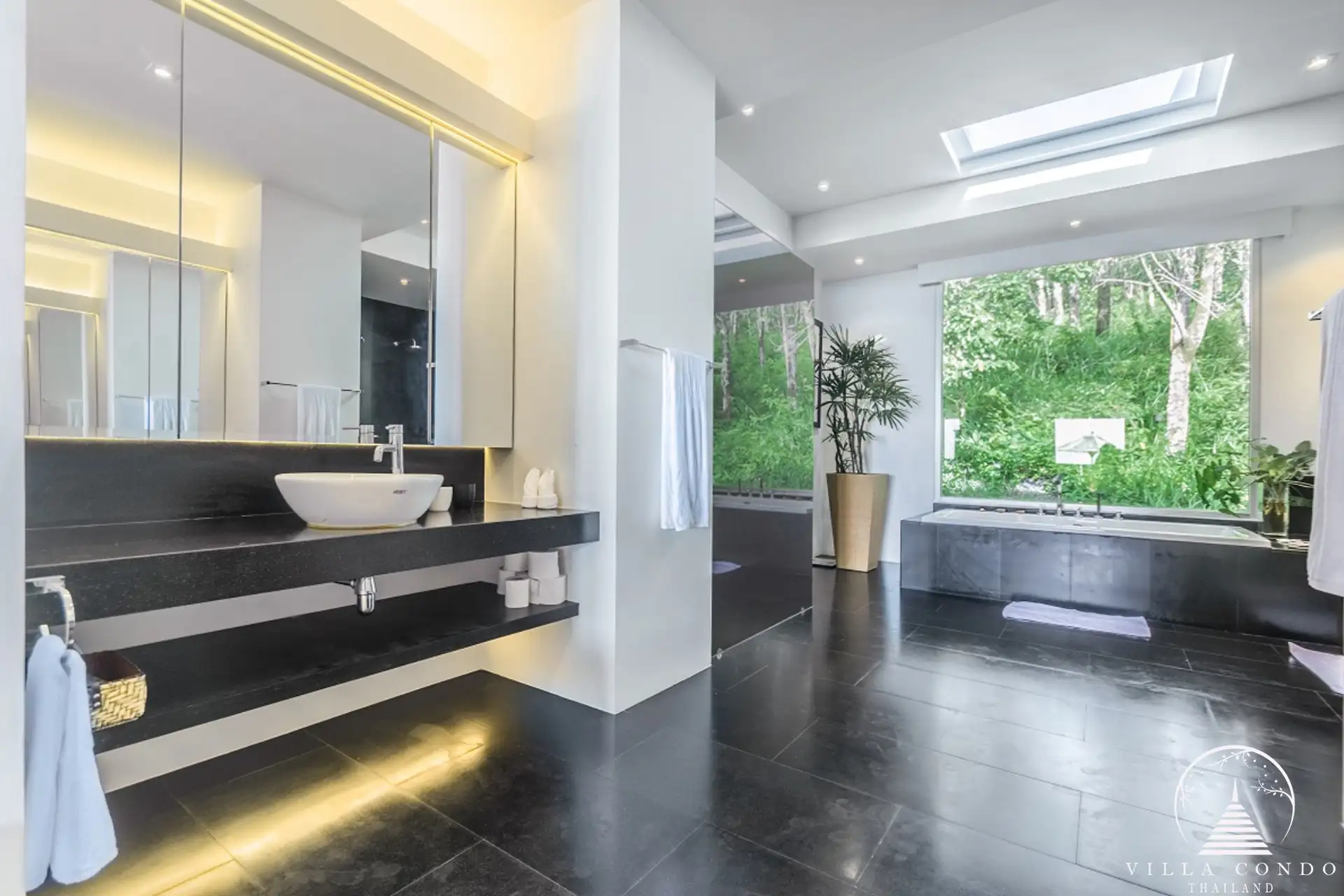 Luxurious master bathroom at Villa Bauhinia with double sinks and bathtub