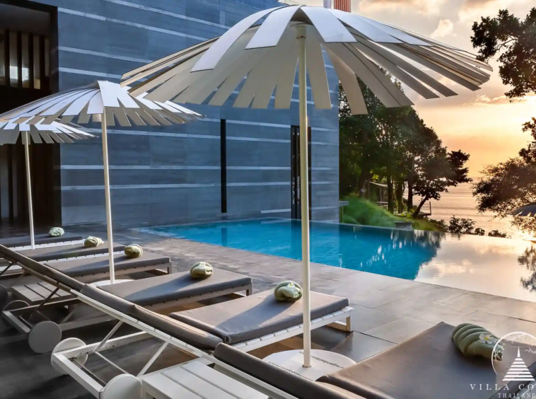 Private pool with sunbed at Villa Mayavee overlooking the sea