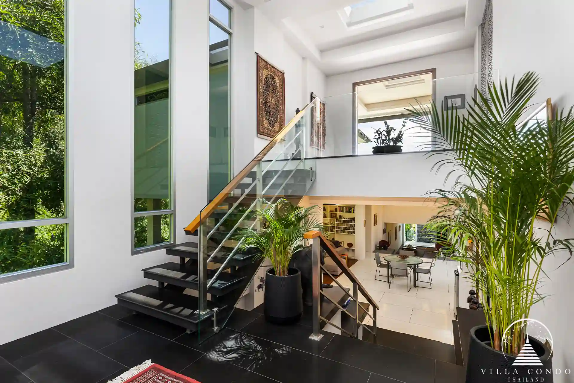 Luxurious interior of Villa Nova at Layan Hillside with elegant furnishings and open-plan design.