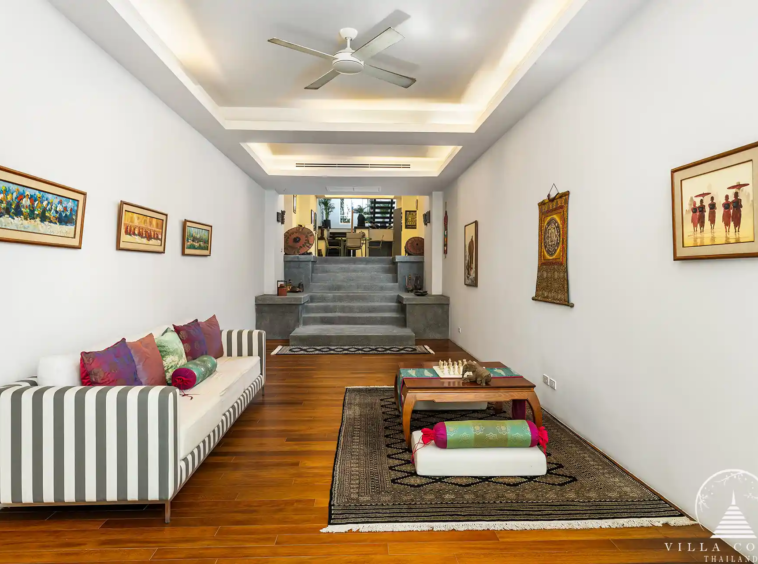 Cozy second living room at Villa Nova at Layan Hillside with modern decor and ocean views.