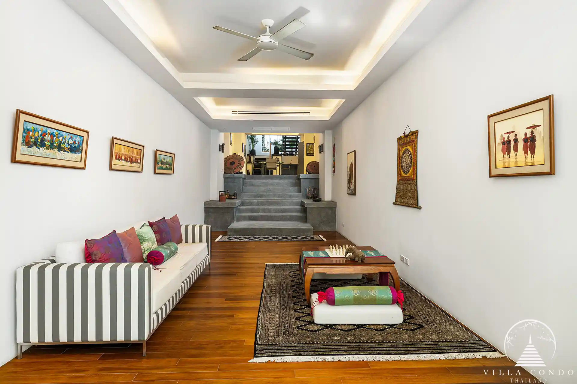 Cozy second living room at Villa Nova at Layan Hillside with modern decor and ocean views.
