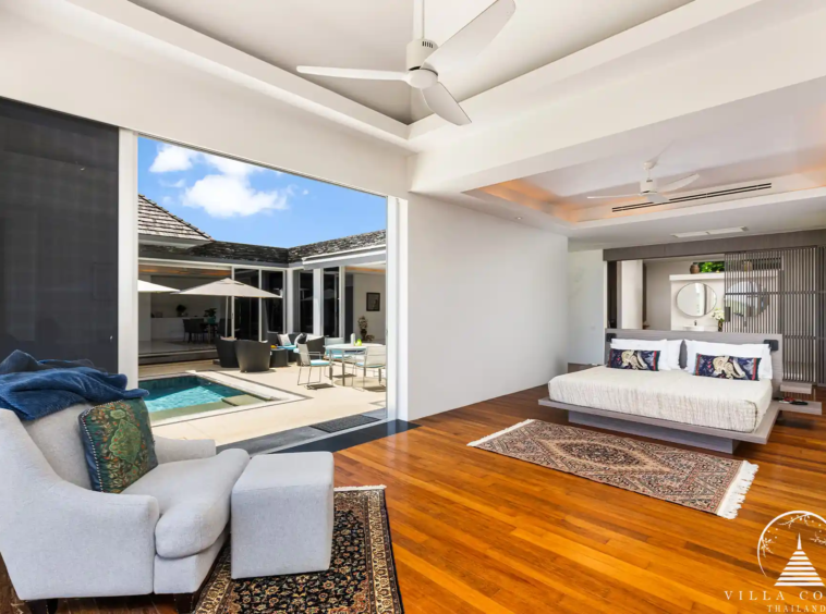 Luxurious master bedroom at Villa Nova at Layan Hillside with panoramic sea views.