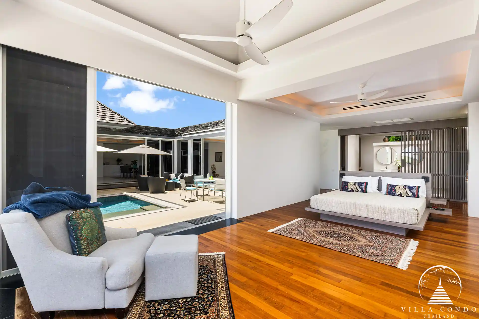 Luxurious master bedroom at Villa Nova at Layan Hillside with panoramic sea views.