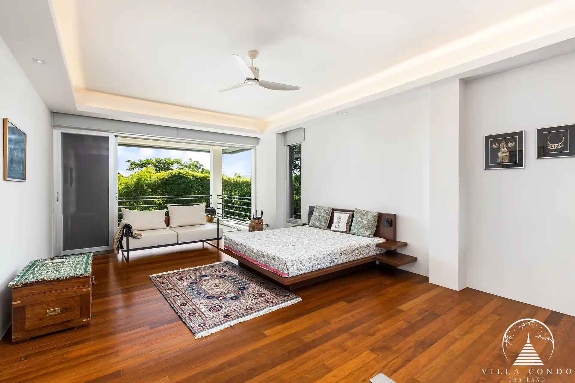 Spacious bedroom in Villa Nova at Layan Hillside with sea views and modern decor.