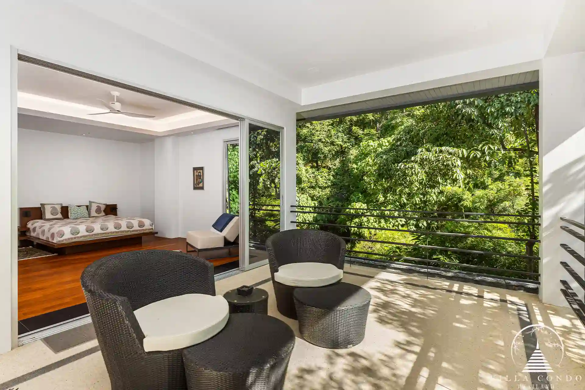 Roofed balcony at Villa Nova at Layan Hillside with ocean views and comfortable seating.