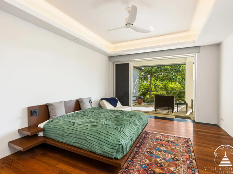 Spacious bedroom in Villa Nova at Layan Hillside with sea views and modern decor.