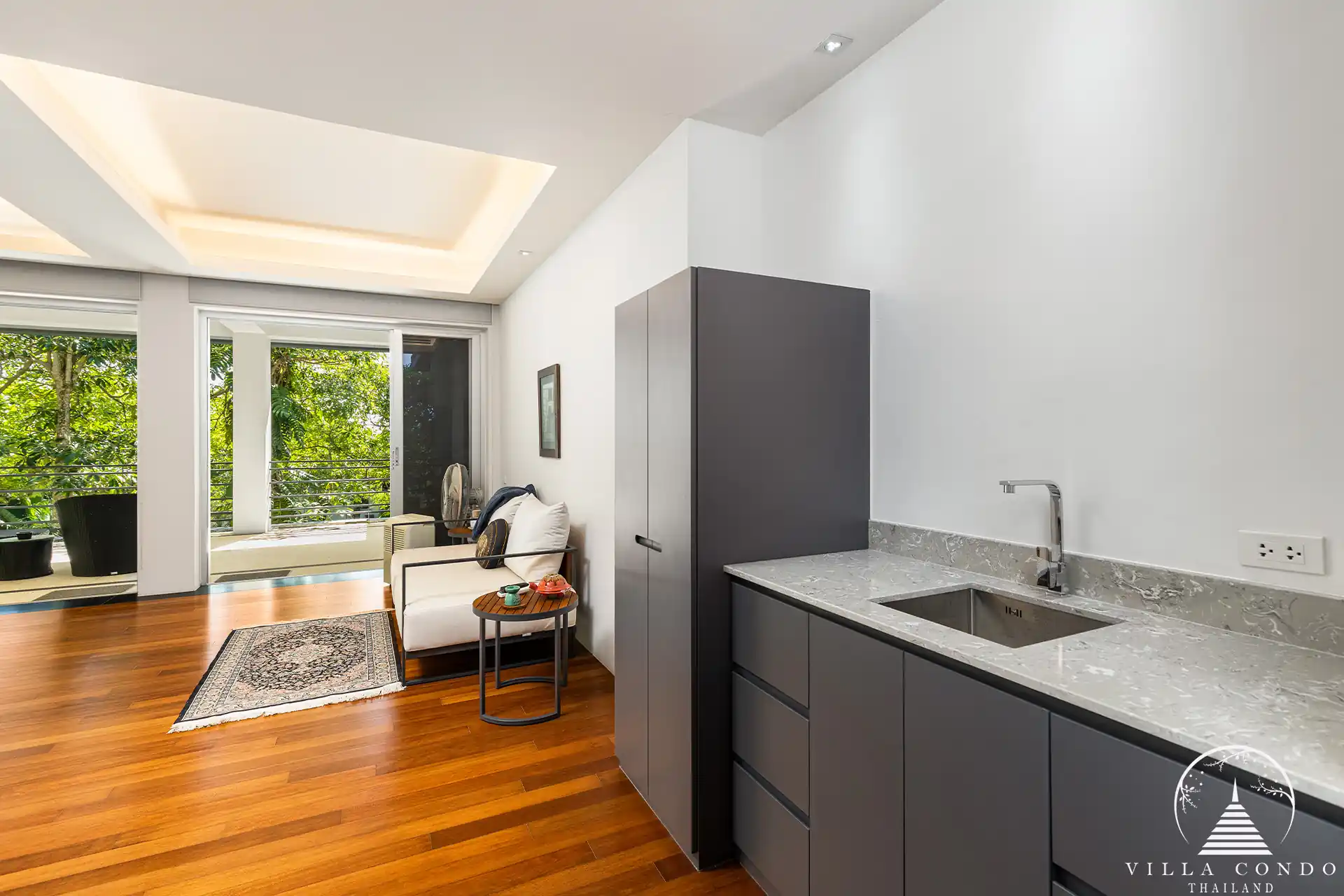 Top-end kitchen in Villa Nova at Layan Hillside with modern appliances and sleek design.