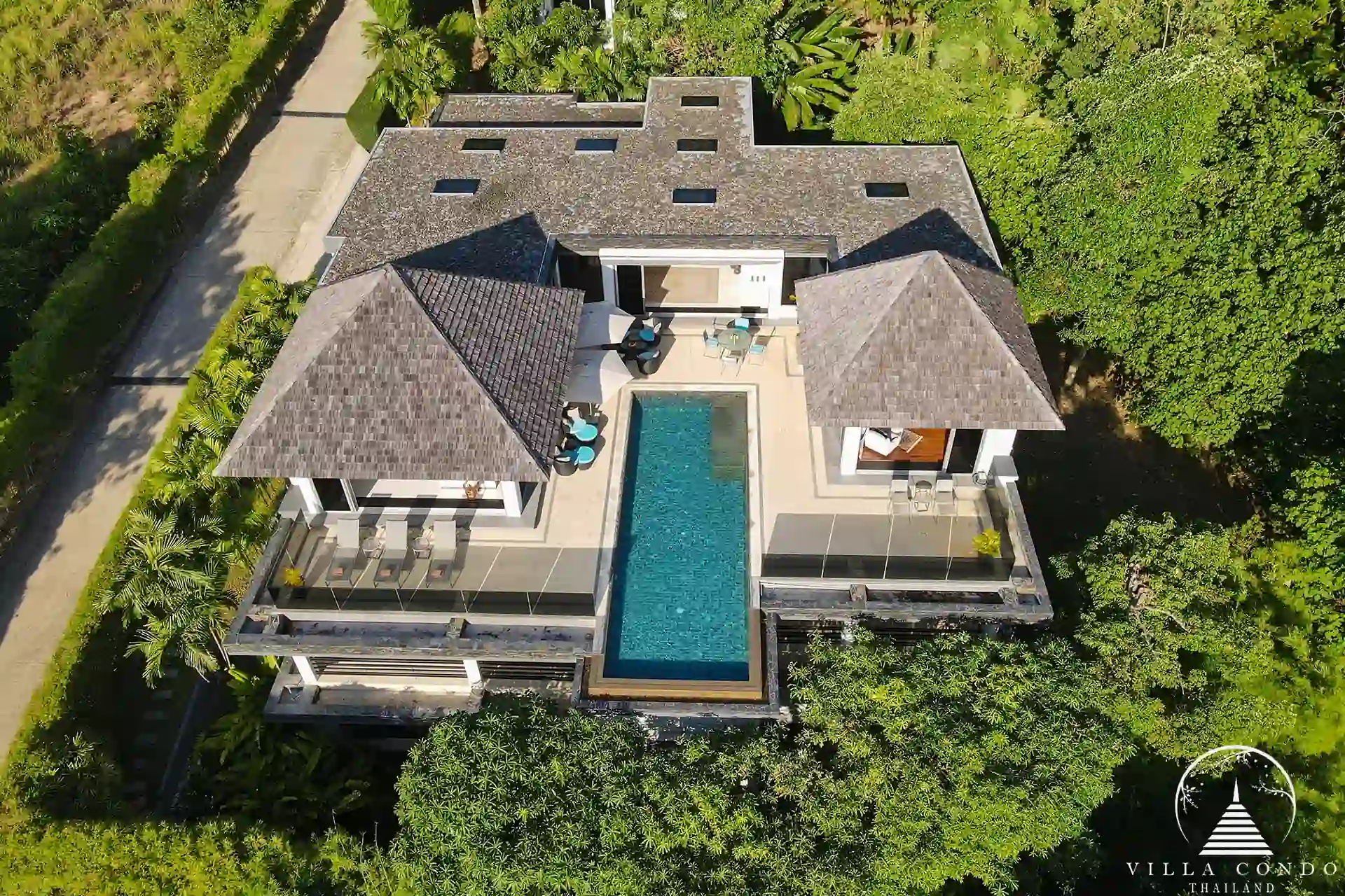 Exterior of Villa Nova at Layan Hillside with modern Asian architecture and panoramic ocean views.