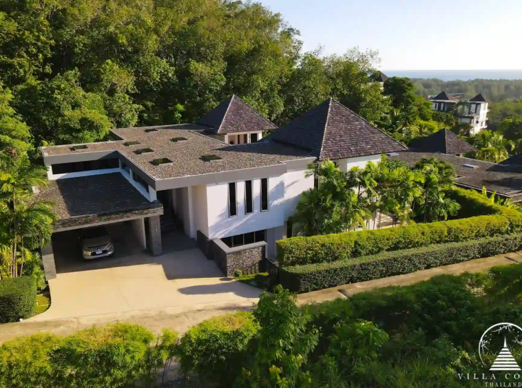 Front view of Villa Nova at Layan Hillside with its distinctive modern architecture.