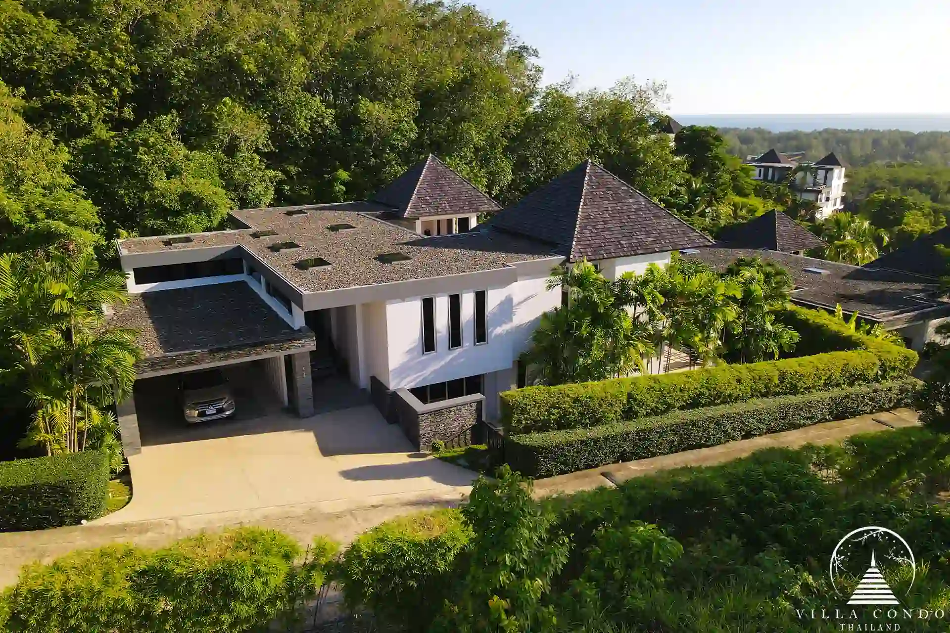 Front view of Villa Nova at Layan Hillside with its distinctive modern architecture.