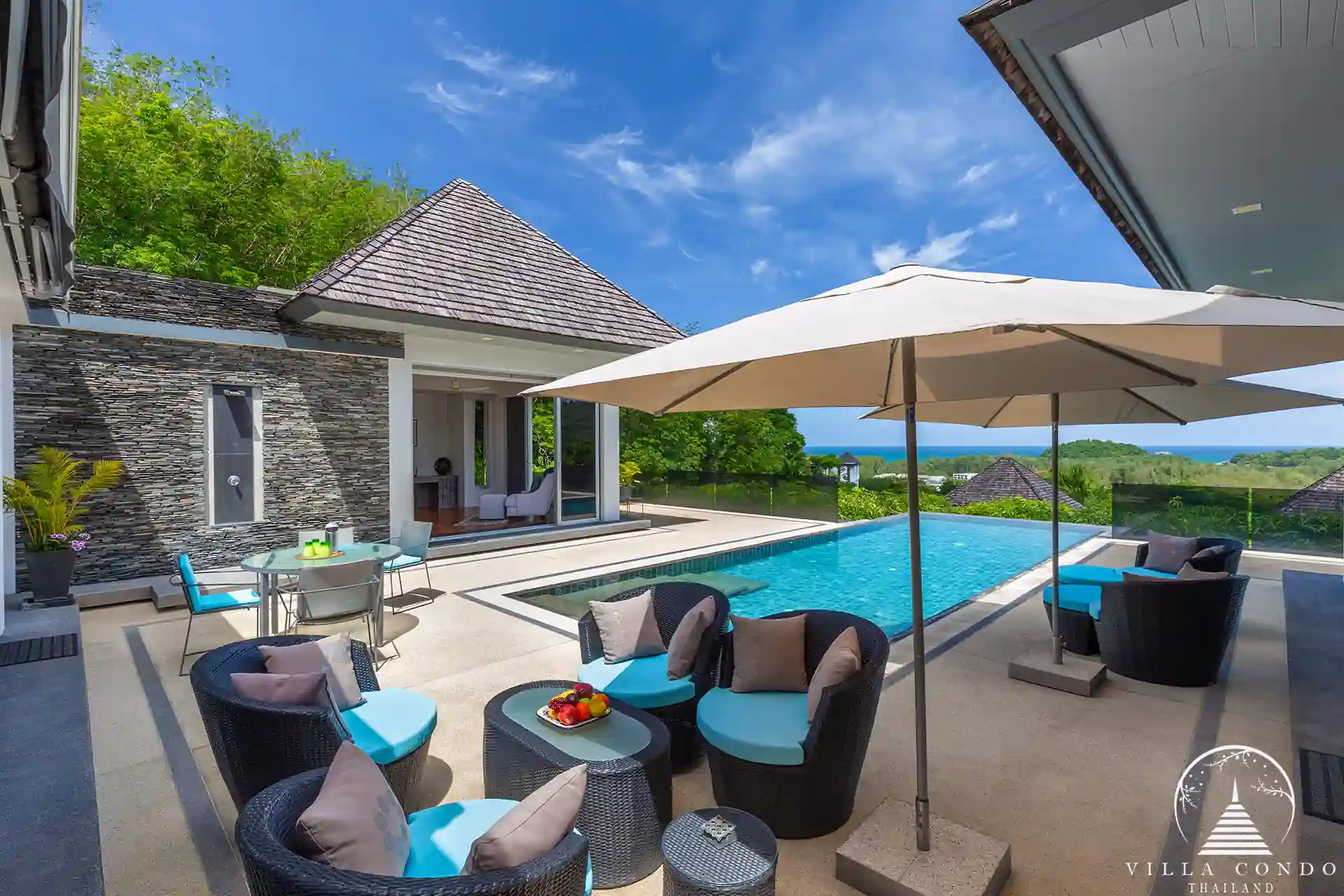 Expansive outdoor terrace at Villa Nova at Layan Hillside with panoramic sea views.