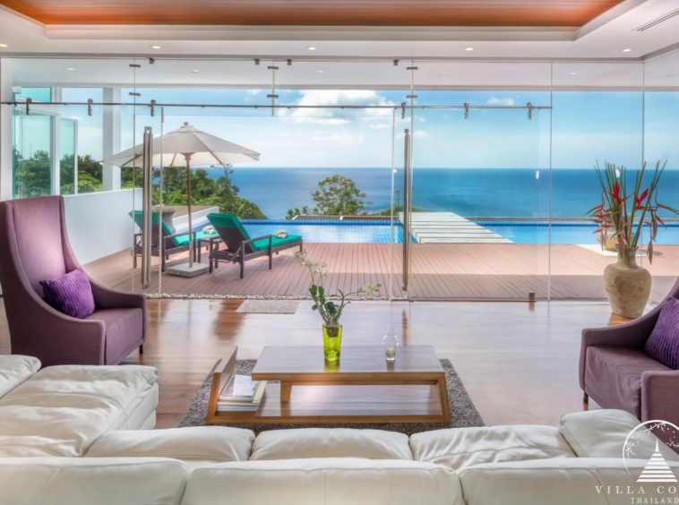 Living area with panoramic sea views at Villa Solaris Kamala.