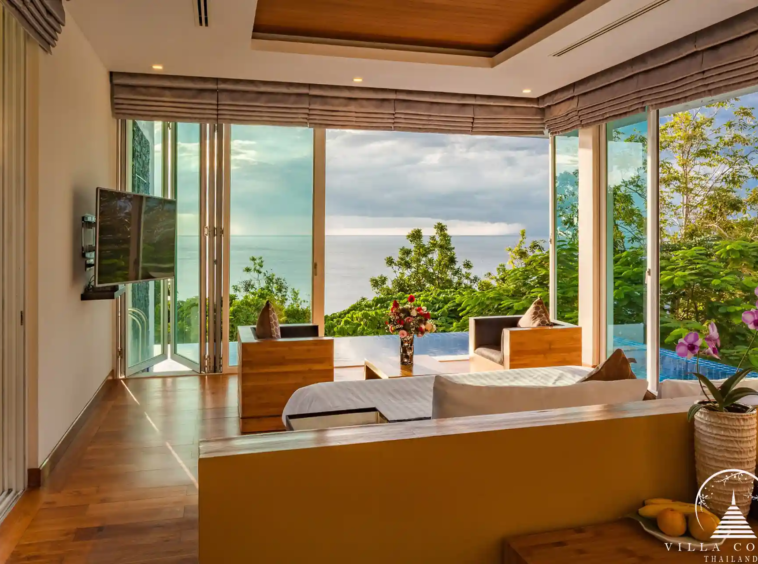 Bedroom with stunning sea view at Villa Solaris Kamala.