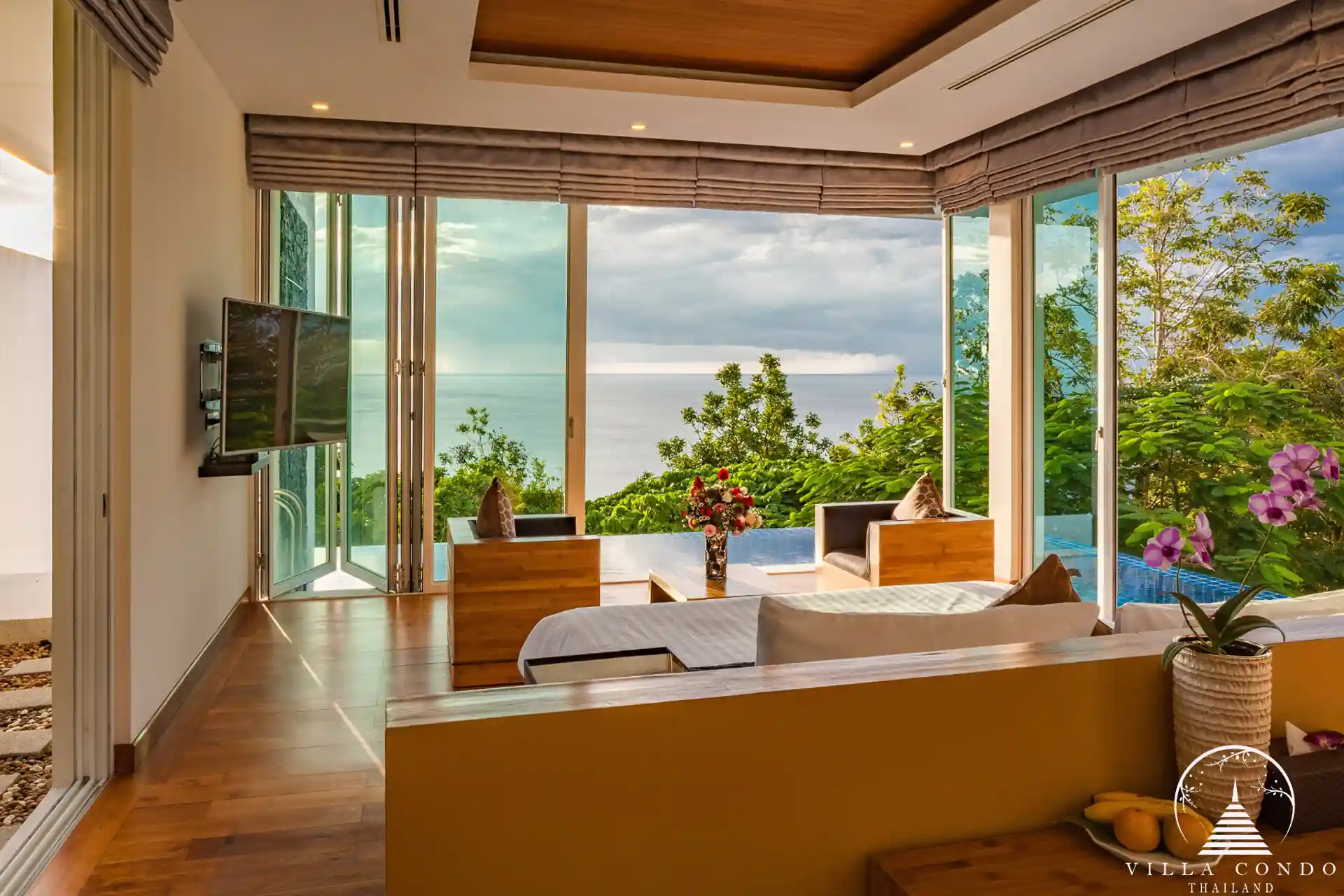 Bedroom with stunning sea view at Villa Solaris Kamala.