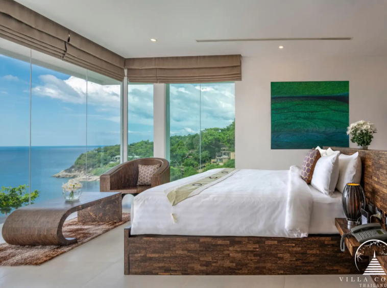 Master bedroom with private pool and sea views at Villa Solaris Kamala.