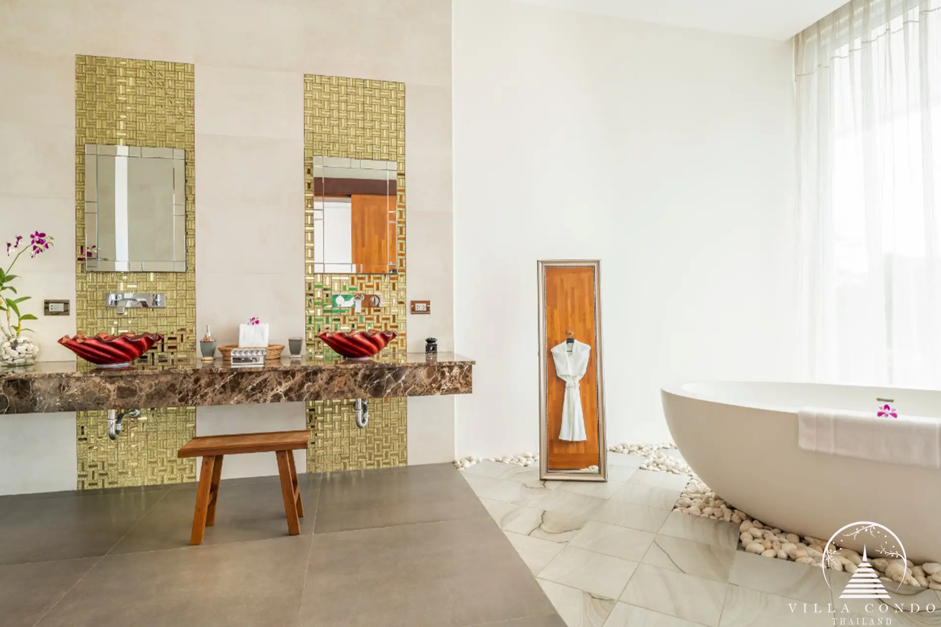 Spacious and luxurious bathroom with sea views in Villa Solaris Kamala.
