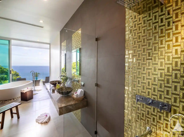 Bathroom with panoramic sea views at Villa Solaris Kamala.