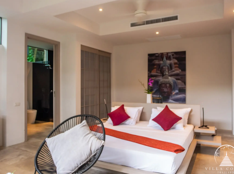 Master bedroom with high ceilings at Villas by the Big Bamboo.