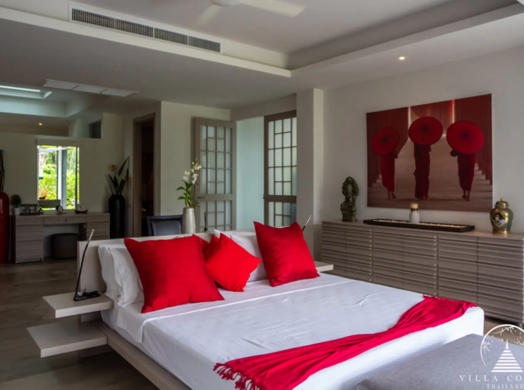 Master bedroom with high ceilings at Villas by the Big Bamboo.