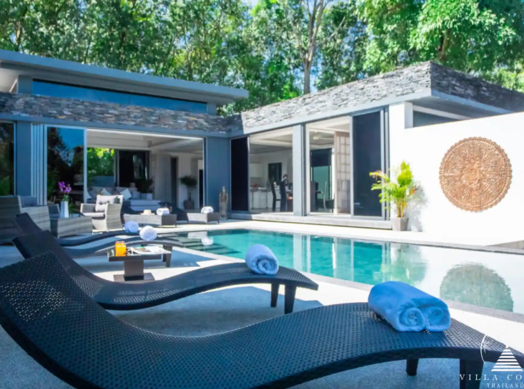 Private pool with sunbeds at Villas by the Big Bamboo.