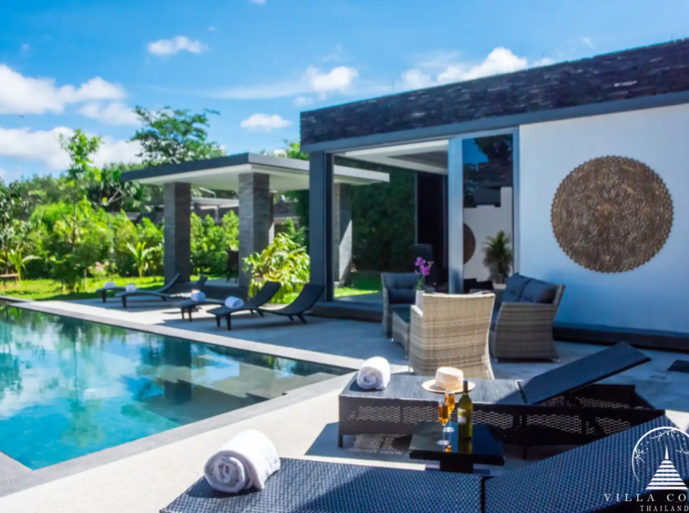 Outdoor area with tropical gardens at Villas by the Big Bamboo.