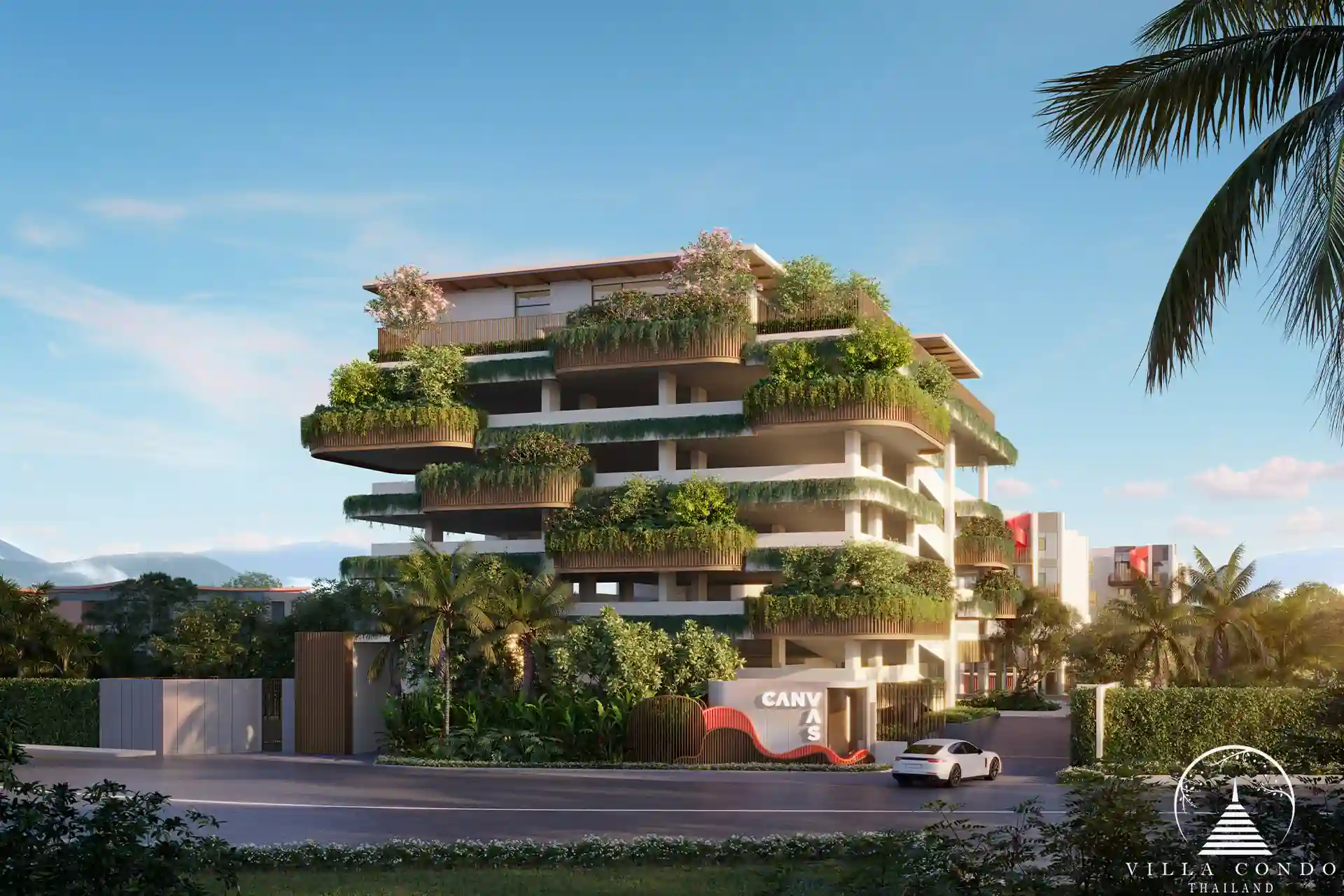 Entrance to CANVAS Cherng Talay condominium, featuring a modern and welcoming design.