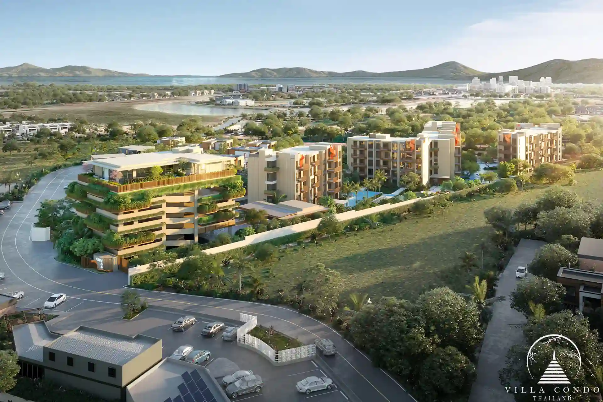Bird’s-eye view of CANVAS Cherng Talay condominium, showcasing the residential buildings and surrounding greenery.