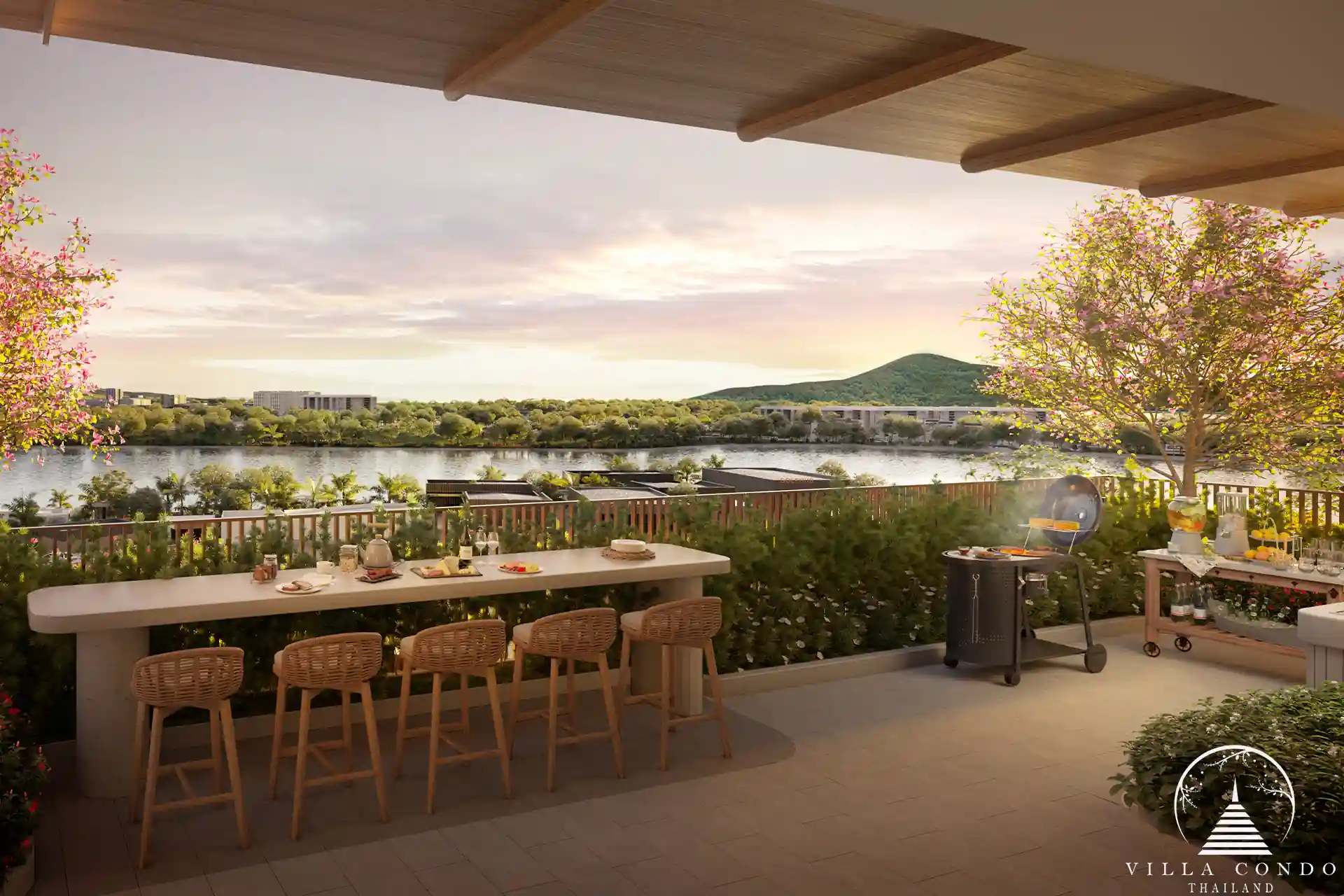 Outdoor area of CANVAS Cherng Talay with lush gardens and shaded seating.