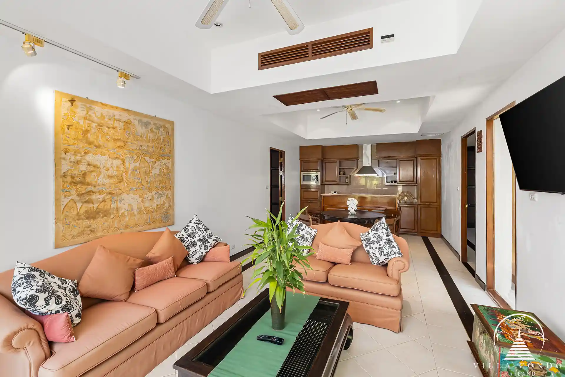 Spacious living area at Nakathani Villa Estate Kamala Beach with high ceilings and ocean views.