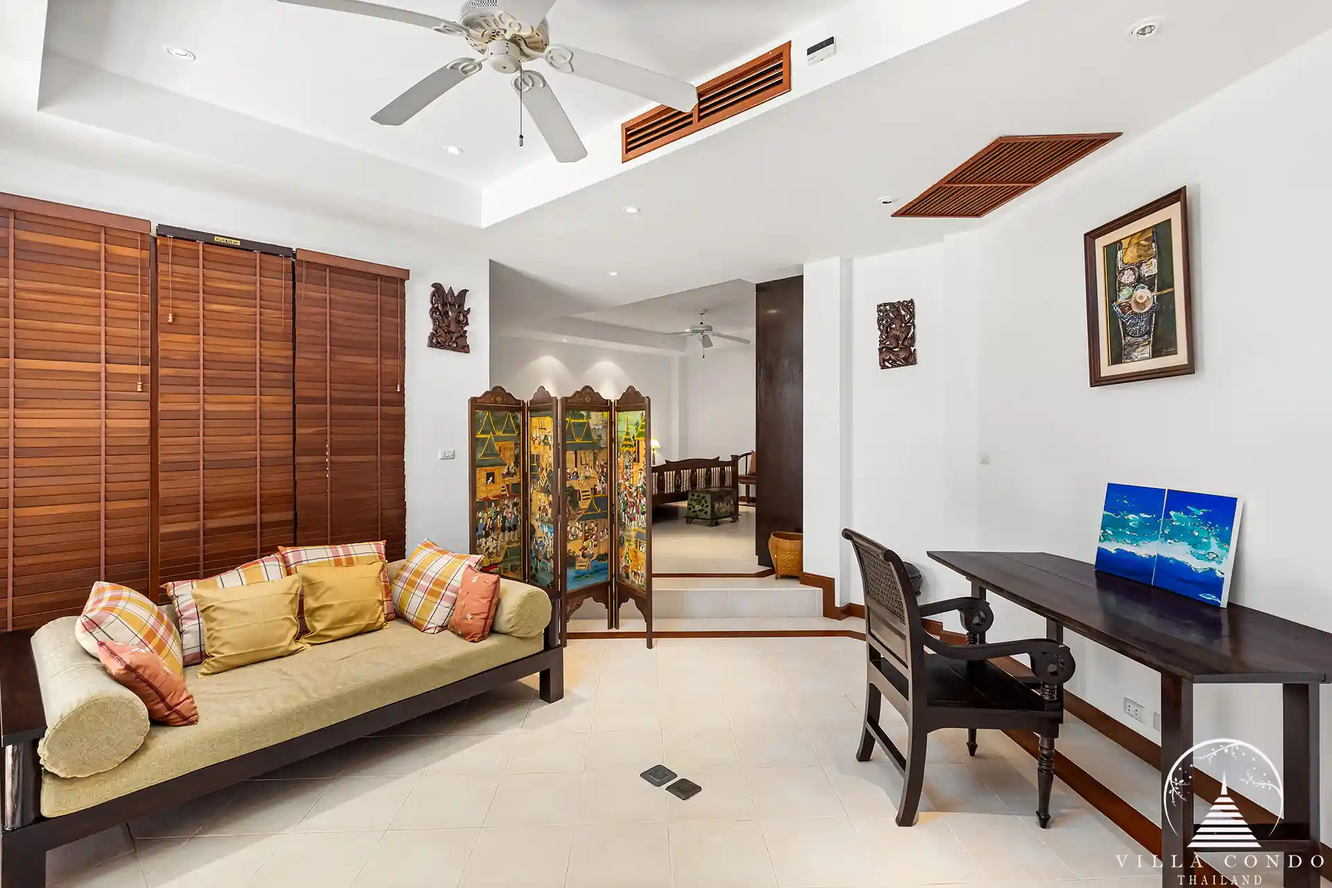 Private office at Nakathani Villa Estate Kamala Beach with wooden furnishings.