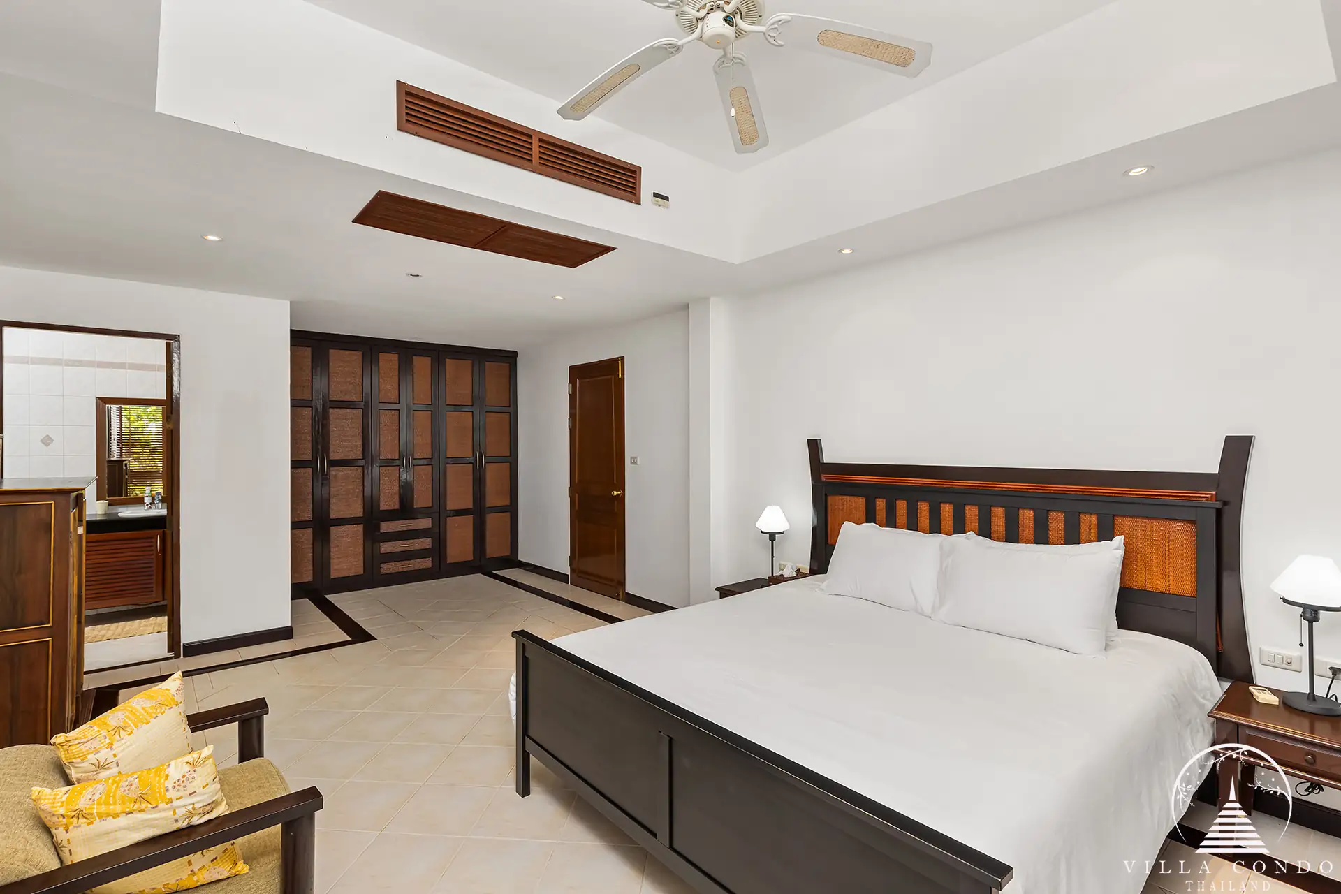 Luxurious master bedroom with ocean views at Nakathani Villa Estate Kamala Beach.